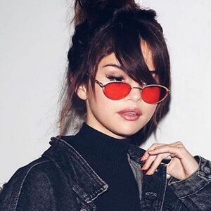 Vintage Caviar red sunglasses seen on Selena Gomez